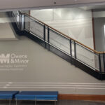 Owens & Minor Corporate Headquarters four-floor open stairwell wall design